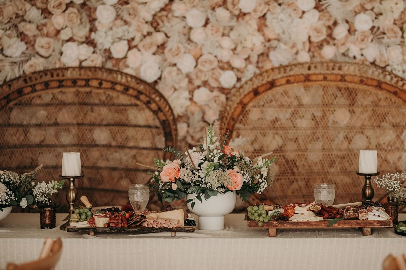 Wicker Chairs Setup with Display + Flower wall