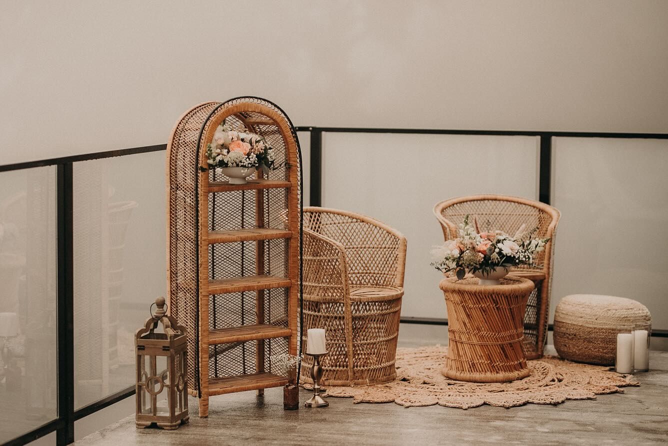 Wicker Rentals Setup With pouf and rug