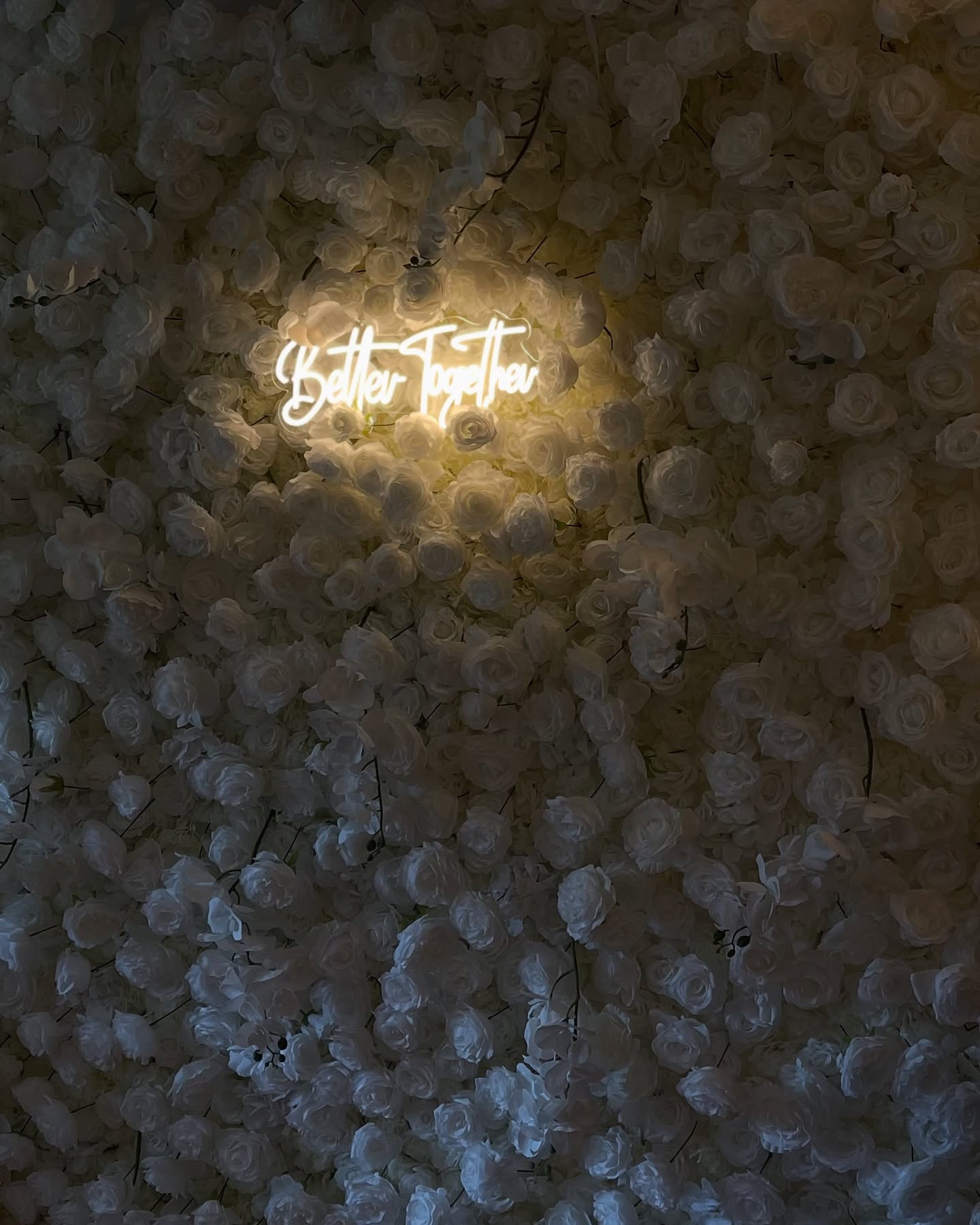 Flower Wall with Neon Sign